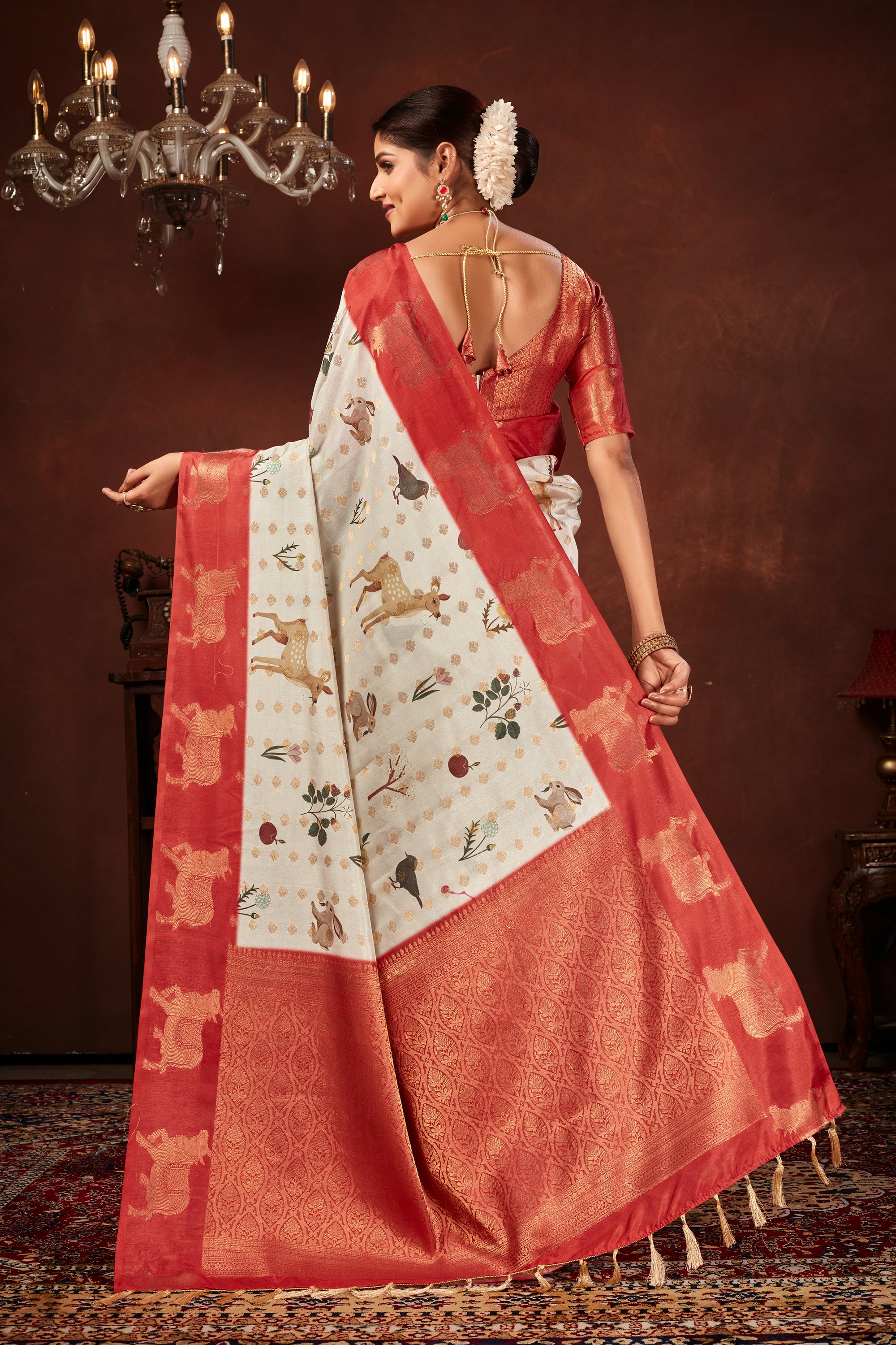White Soft Silk Saree with Animal Prints & Rich Weave Pallu