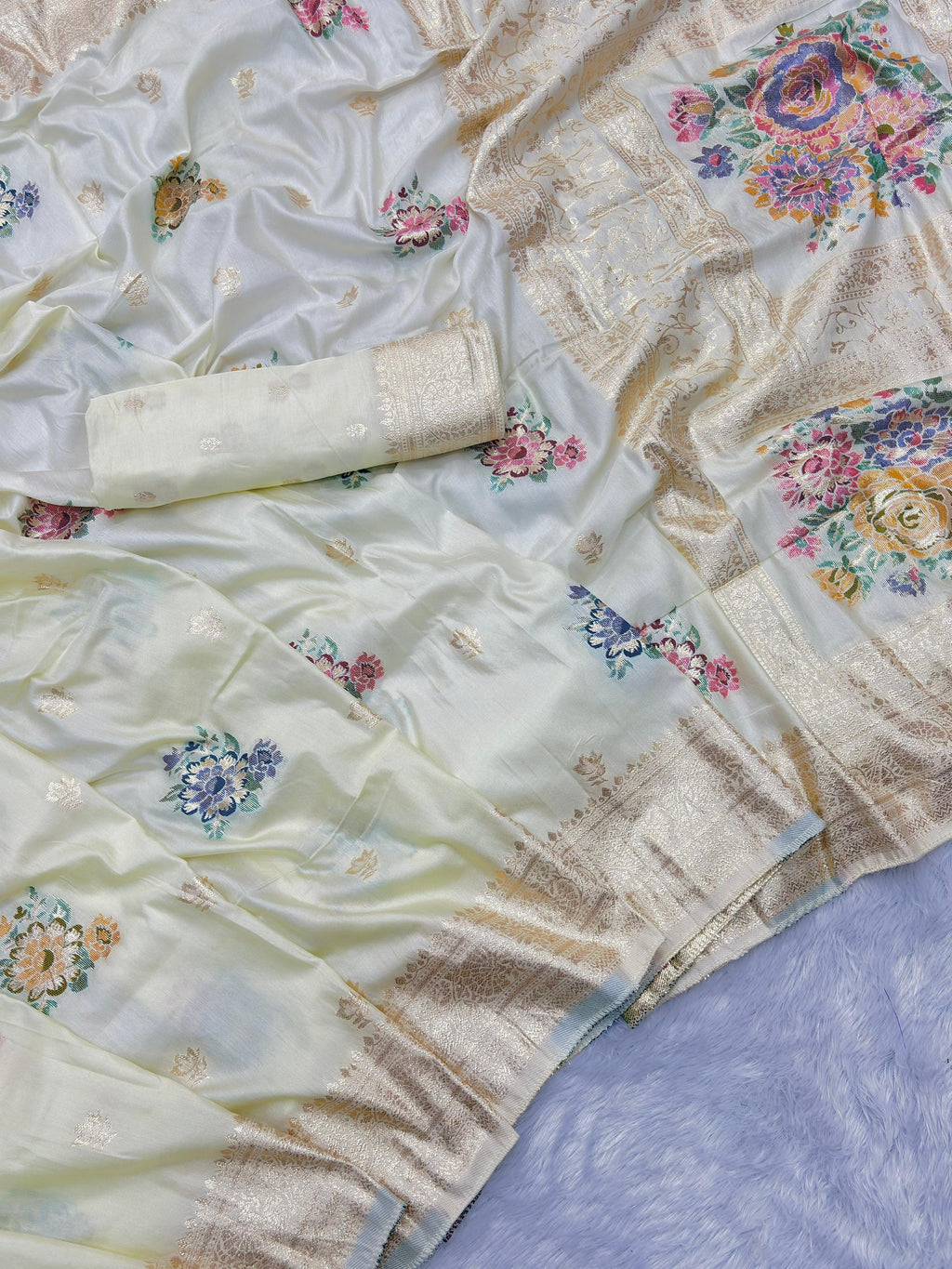 Cream Pure Viscose Muslin Saree with Floral Meenakari Weave and Arco Work Border
