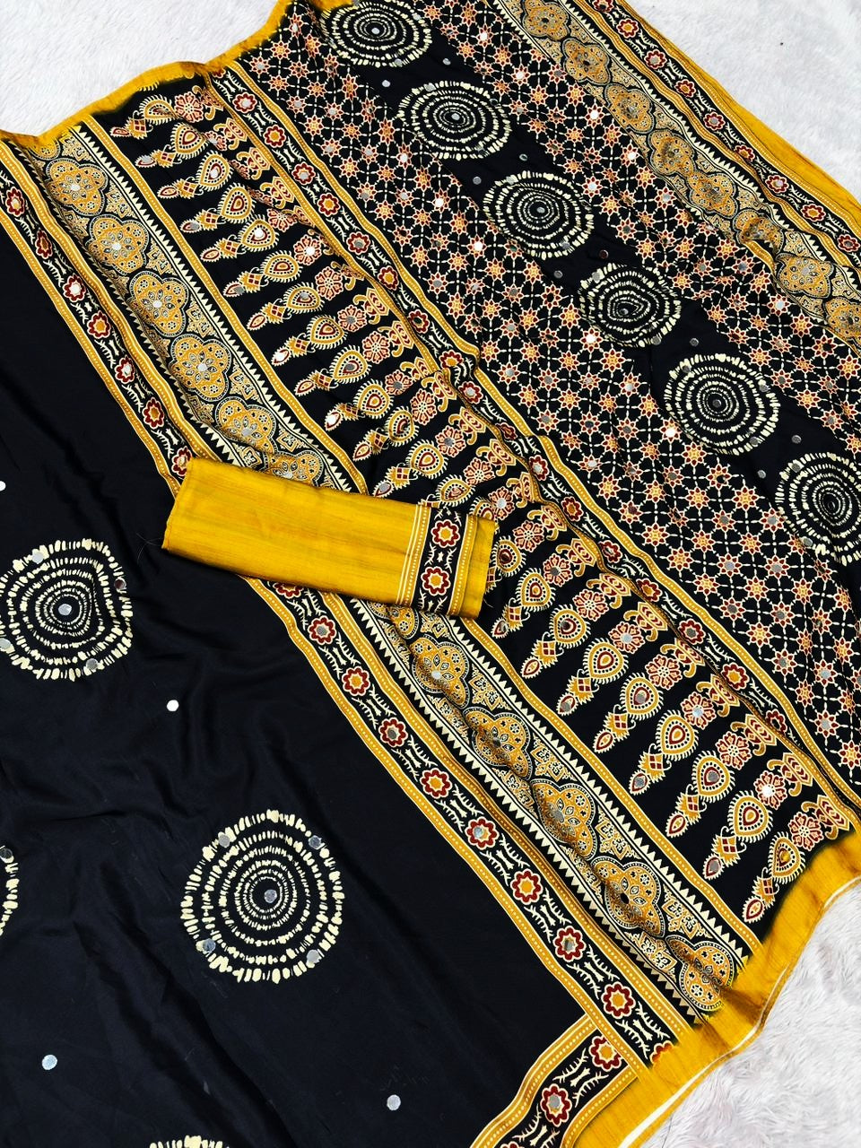 Ajrika Crepe Silk Saree – Black Mustard Ajrakh Digital Print with Mirror Work