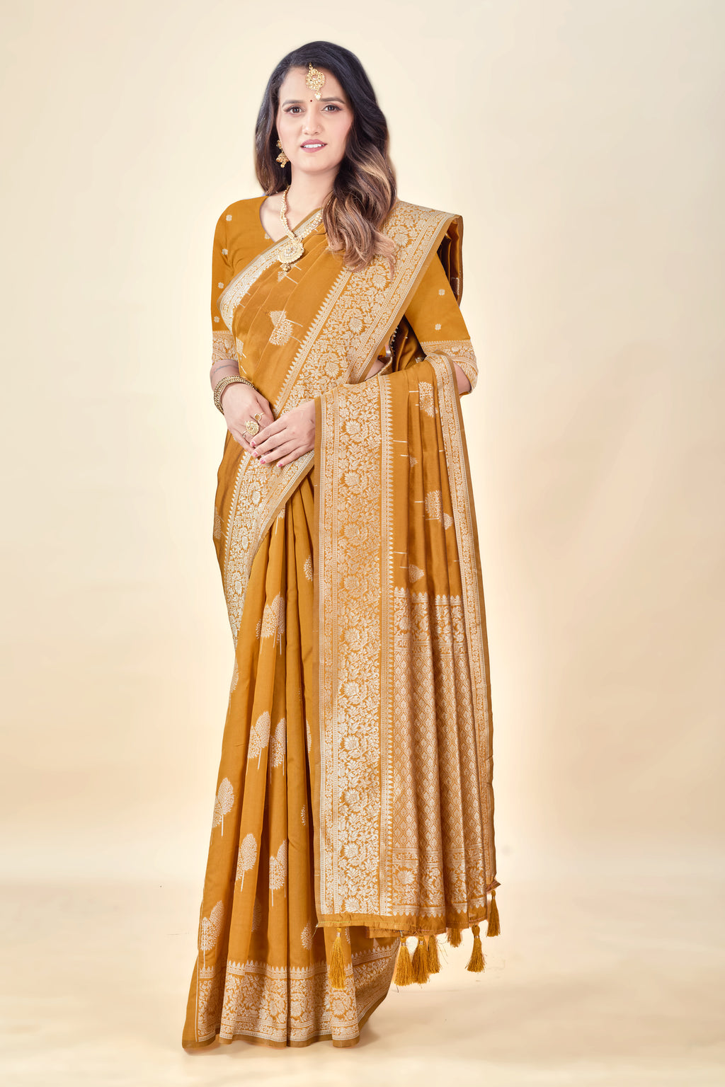 Mustard Soft Litchi Silk Saree with Silver Zari Tree Motifs & Tassel Pallu