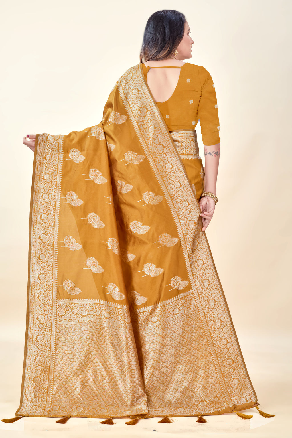 Mustard Soft Litchi Silk Saree with Silver Zari Tree Motifs & Tassel Pallu