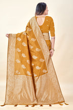 Mustard Soft Litchi Silk Saree with Silver Zari Tree Motifs & Tassel Pallu