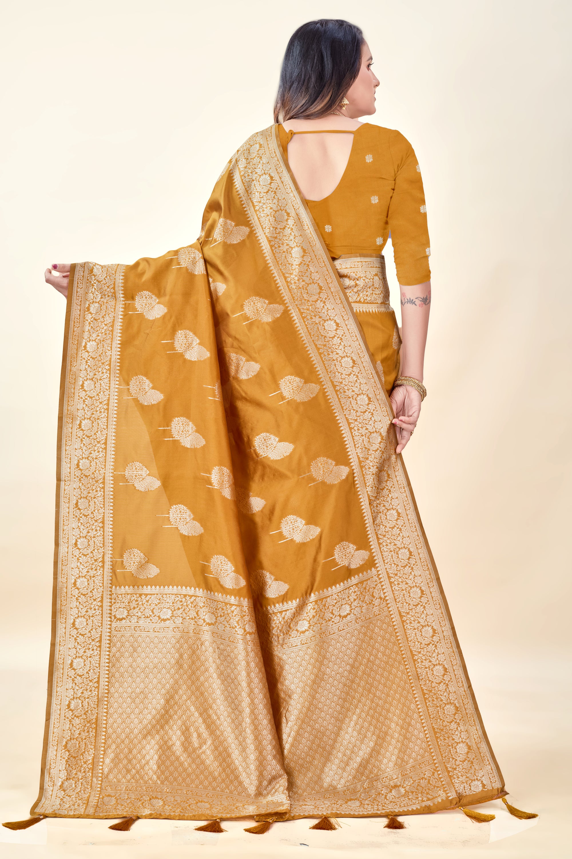 Mustard Soft Litchi Silk Saree with Silver Zari Tree Motifs & Tassel Pallu