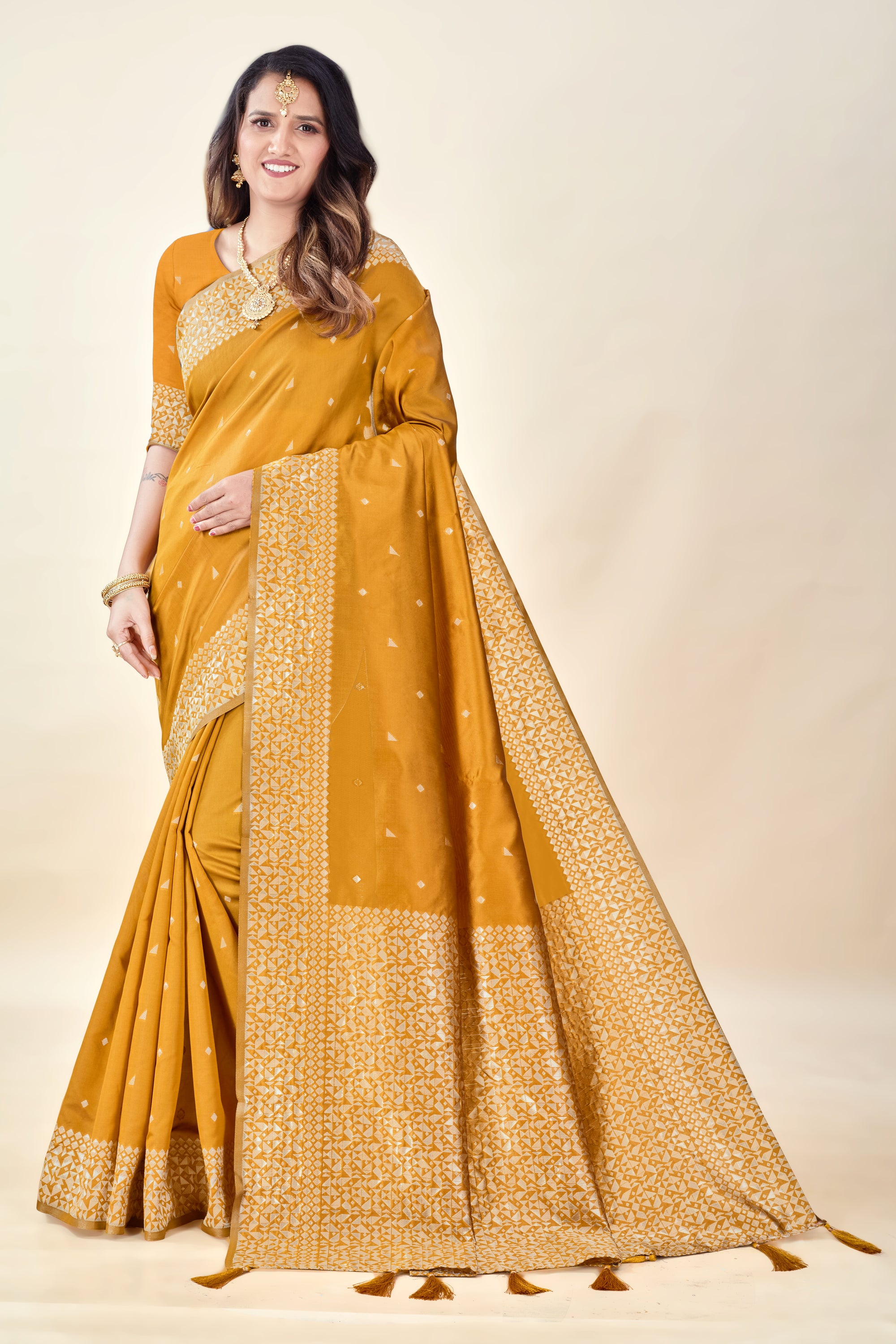 Mustard Soft Litchi Silk Saree with Silver Zari Weave & Tassel Pallu