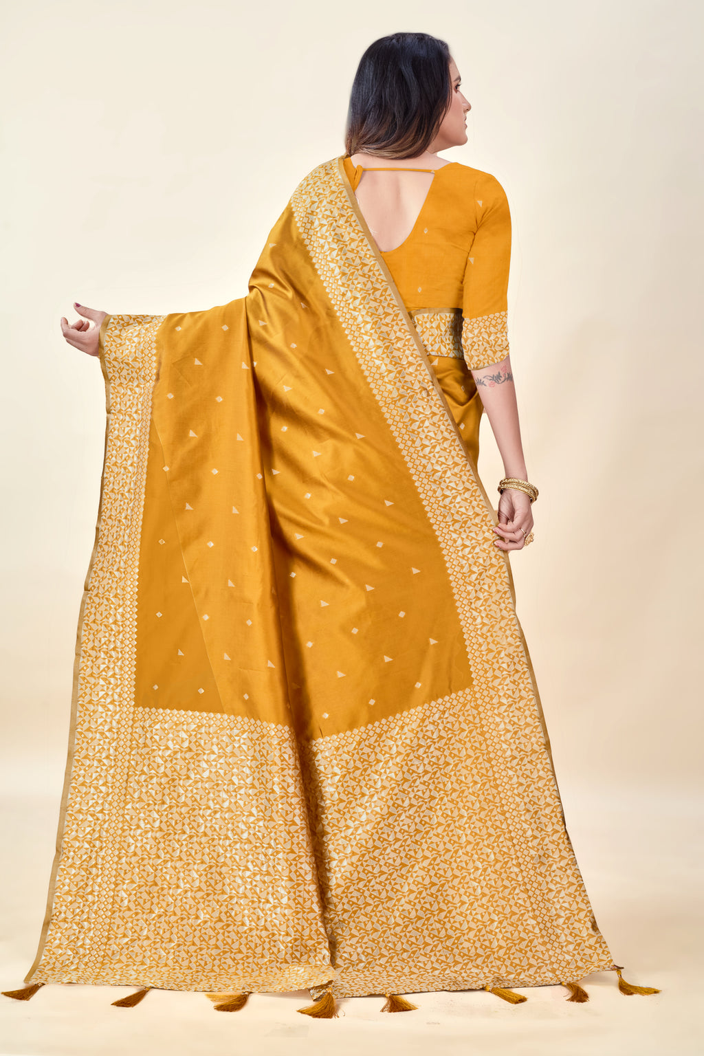 Mustard Soft Litchi Silk Saree with Silver Zari Weave & Tassel Pallu